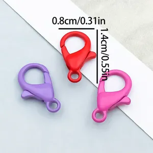 Close-up detail of colorful alloy lobster clasps with dimension measurements in cm and inches