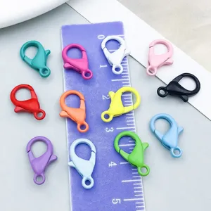Detailed macro view showing assorted colorful painted alloy lobster clasps for jewelry DIY
