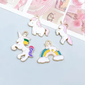Detailed view of colorful alloy enamel unicorn and rainbow charms for DIY jewelry