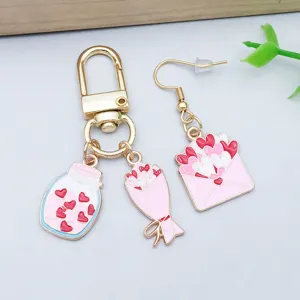 Detailed macro view of heart-themed enamel charms for Valentine's Day jewelry DIY