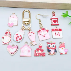 Close-up view of various colorful Valentine's Day enamel alloy charms and pendants