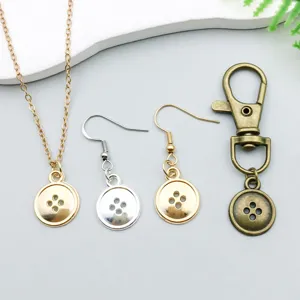 Set van 4-gaats knoopbedels in goud, zilver en brons voor het zelf maken van sieraden