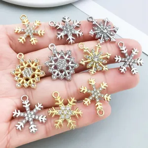 Detailed view of ten sparkling rhinestone snowflake charms for DIY jewelry making