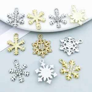 Detailed view of assorted Christmas snowflake pendants with rhinestones for DIY jewelry