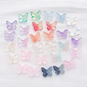 Detailed view of 30 colorful gradient butterfly glass beads for DIY jewelry making