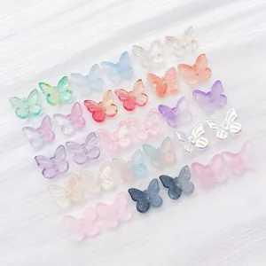 Detailed view of 30 pieces colorful gradient butterfly beads for DIY jewelry making.