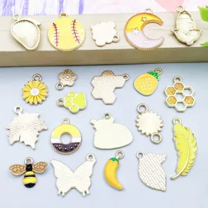 Detailed display of 20pcs mixed yellow enamel alloy charms for DIY jewelry making crafts