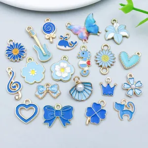 Assorted blue enamel alloy charms featuring animal, flower, and music shapes for DIY jewelry