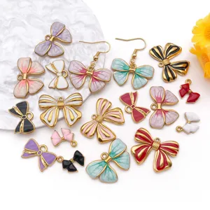 Surtido de colgantes y pendientes de lazo de esmalte para crear joyas artesanales