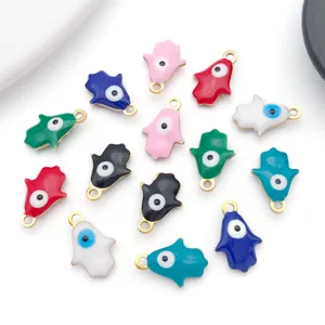 Detailed view of colorful stainless steel Hamsa hand evil eye charms for DIY jewelry making