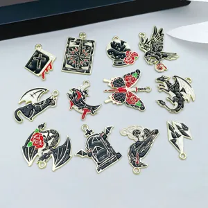 Detailed view of various black enamel Halloween alloy charms for DIY jewelry and crafts