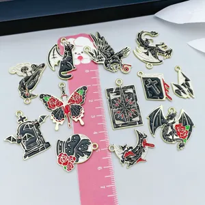Halloween dragon and crow enamel charms for DIY jewelry with size reference ruler