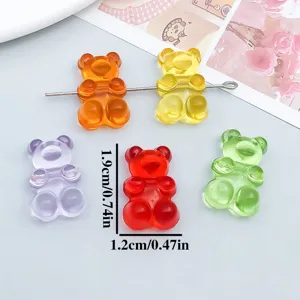 Close-up detail showing 1.9cm x 1.2cm size of these colorful acrylic gummy bear pendants.