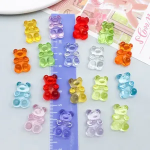 Close-up of colorful transparent acrylic bear charms for DIY jewelry making