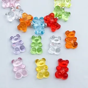 Close-up of colorful transparent acrylic gummy bear charms for DIY necklace and bracelet jewelry