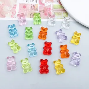 Macro view of 20 mixed-color transparent acrylic gummy bear charms for DIY jewelry