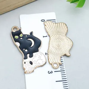 Detailed Halloween black cat on skull enamel charm with ruler showing 3cm size.