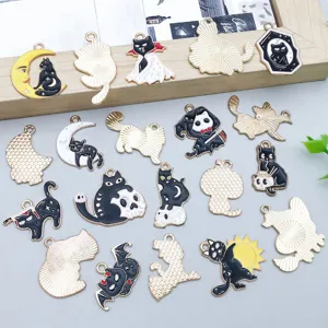 Detailed view of 20 assorted Halloween black and white cat skull enamel charms for DIY