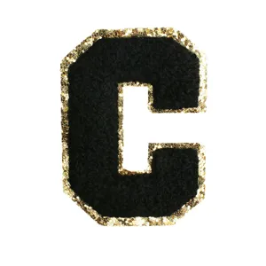 Black terry embroidery letter C patch with gold sequin border for DIY clothing and bags.