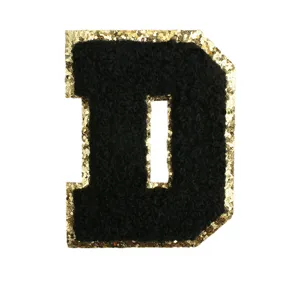 Black and gold glitter letter D chenille embroidery patch detail for DIY clothing bags.