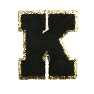 Black and gold glitter letter K chenille patch detail shot, perfect for diy apparel decoration.