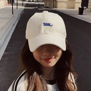 Casual white baseball cap with stylish blue embroidery, perfect for daily outdoor wear.