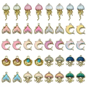 Colección de dijes marinos de aleación con medusas, delfines y colas de sirena DIY.