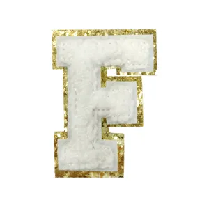 White chenille letter F patch with gold glitter border for DIY clothing and bags.