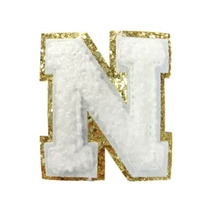 White chenille letter N patch with gold glitter border, perfect for DIY clothing and bags.