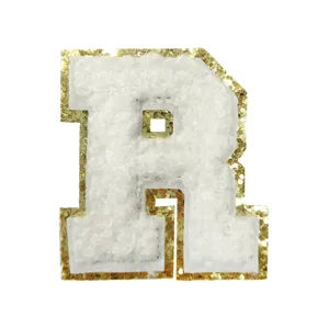 White chenille letter R patch with gold glitter border for DIY clothing, bags and accessories decor.