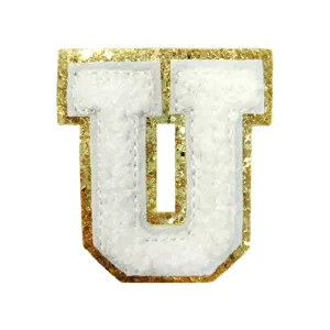 Detail shot of white chenille letter U patch with gold glitter border for DIY clothing bags.