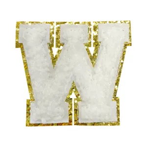 White chenille letter W patch with gold glitter border for DIY clothing bag decoration.