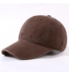 Detail view of brown cotton soft top baseball cap, casual plain sun hat for daily wear.