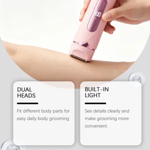 Close-up detail of the pink electric hair removal device showing dual heads and light.