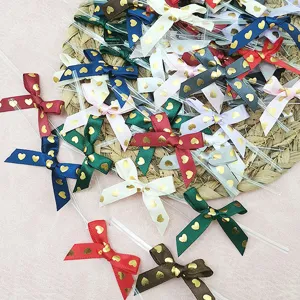Colorful 45mm gold-stamped heart pattern ribbon bows with twist ties for DIY gift boxes