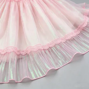 Close-up pink iridescent pleated mesh lace trim, perfect for DIY crafts and decoration.