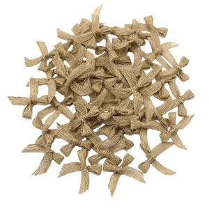 Jute burlap bows detail view, natural rustic texture, perfect for DIY crafts and gift box decoration.