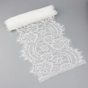 White lace fabric roll detail, 22cm wide, featuring floral eyelash trim for wedding dress and crafts.
