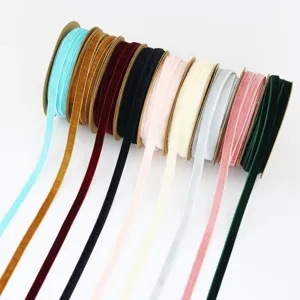 Colorful velvet ribbon spools set for DIY crafts, gift wrapping, and handmade hair accessories.