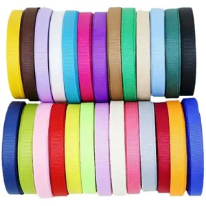 Colorful grosgrain ribbon detail, vibrant multi-color fabric rolls for DIY craft sewing decor.