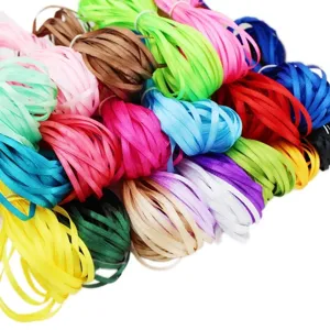 Colorful satin ribbon cords detail view, multi-color craft DIY decorative string bundles