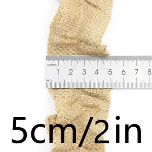 Detailed close-up view of the 5cm wide natural jute burlap ribbon with ruffled edge for decor.