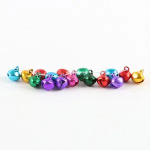 Colorful jingle bells for Christmas tree DIY craft and holiday party decoration details.