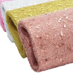 Close-up glitter tulle fabric roll in multi-color, perfect for party and DIY sewing decor.