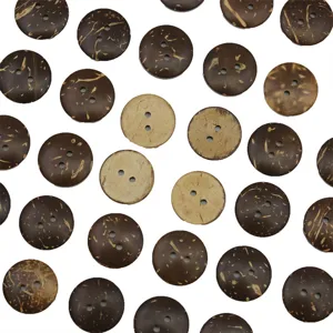 Detailed view of natural coconut shell buttons, round shape with two holes and unique textures.