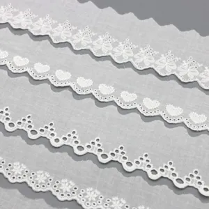 White cotton lace trim embroidery ribbon for DIY sewing apparel craft wedding decor.