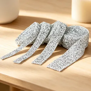 Silver rhinestone trim ribbon detail, sparkly hot fix crystal tape for DIY clothing crafts.
