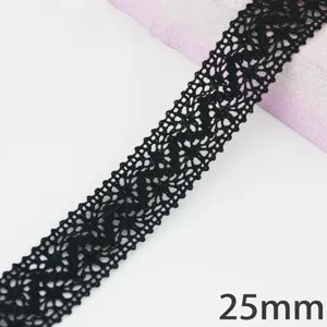 Close-up detail of black lace trim, 25mm width, perfect for gift packaging and DIY crafts.