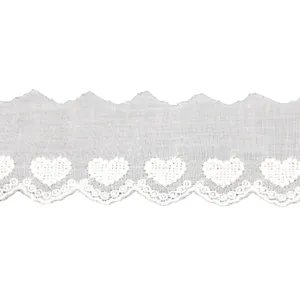 White cotton lace trim with sweet heart embroidery and scalloped edges for DIY sewing and crafts.