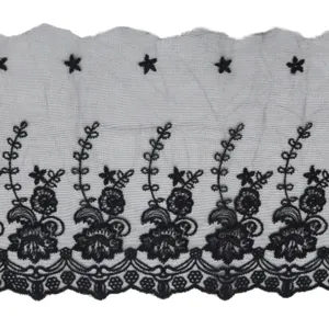Black mesh lace trim detail, delicate floral and star embroidery with scalloped edge design.